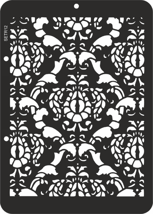 Decorative stencil with intricate black and white pattern on a black background